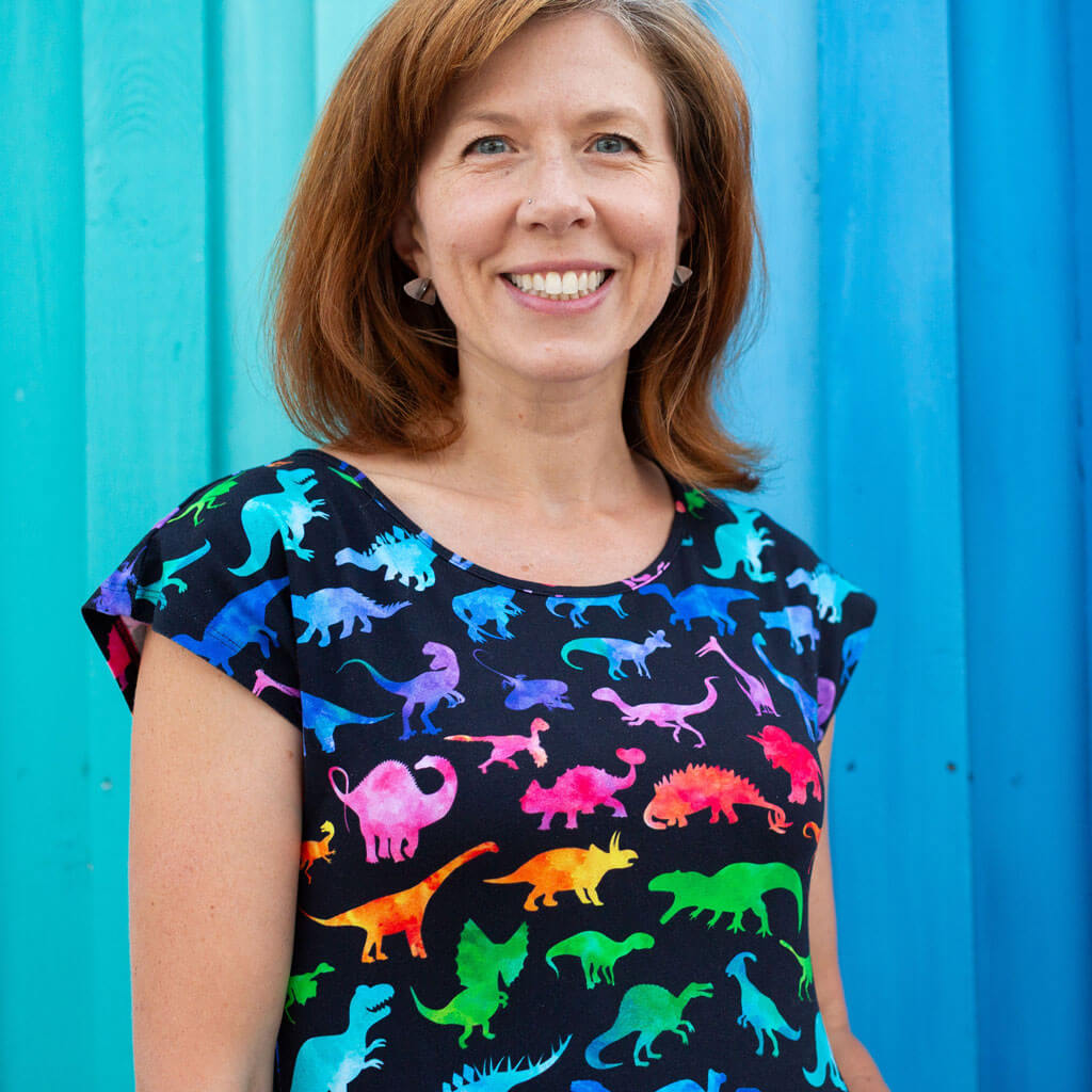 Adult "Prehistoric Parade" Rainbow of Dinosaurs Dress with Pockets
