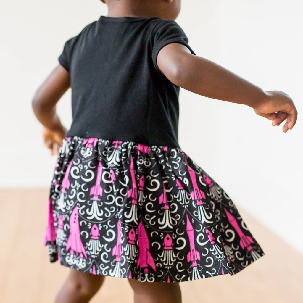 "Fleur-de-Liftoff" Rockets Snapsuit Dress