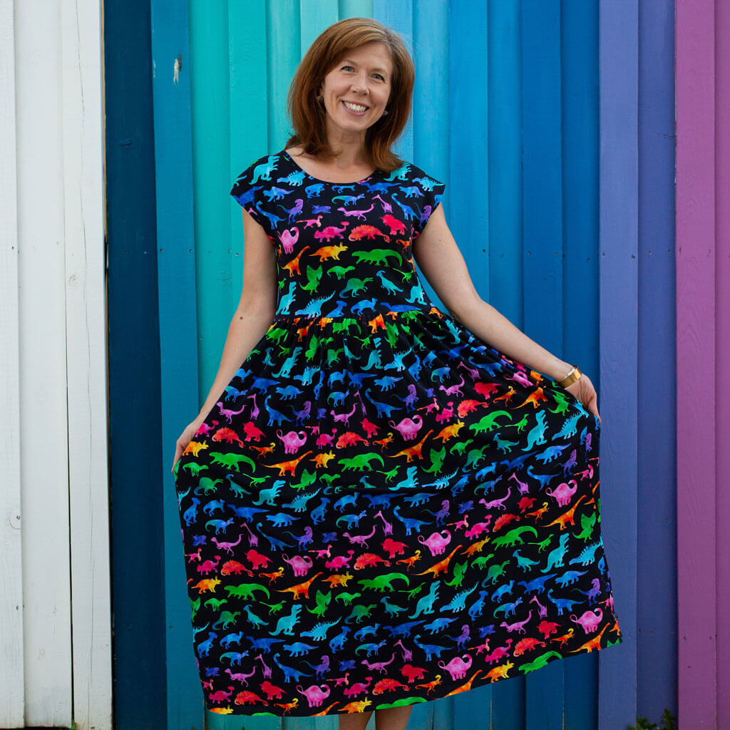 Adult "Prehistoric Parade" Rainbow of Dinosaurs Dress with Pockets