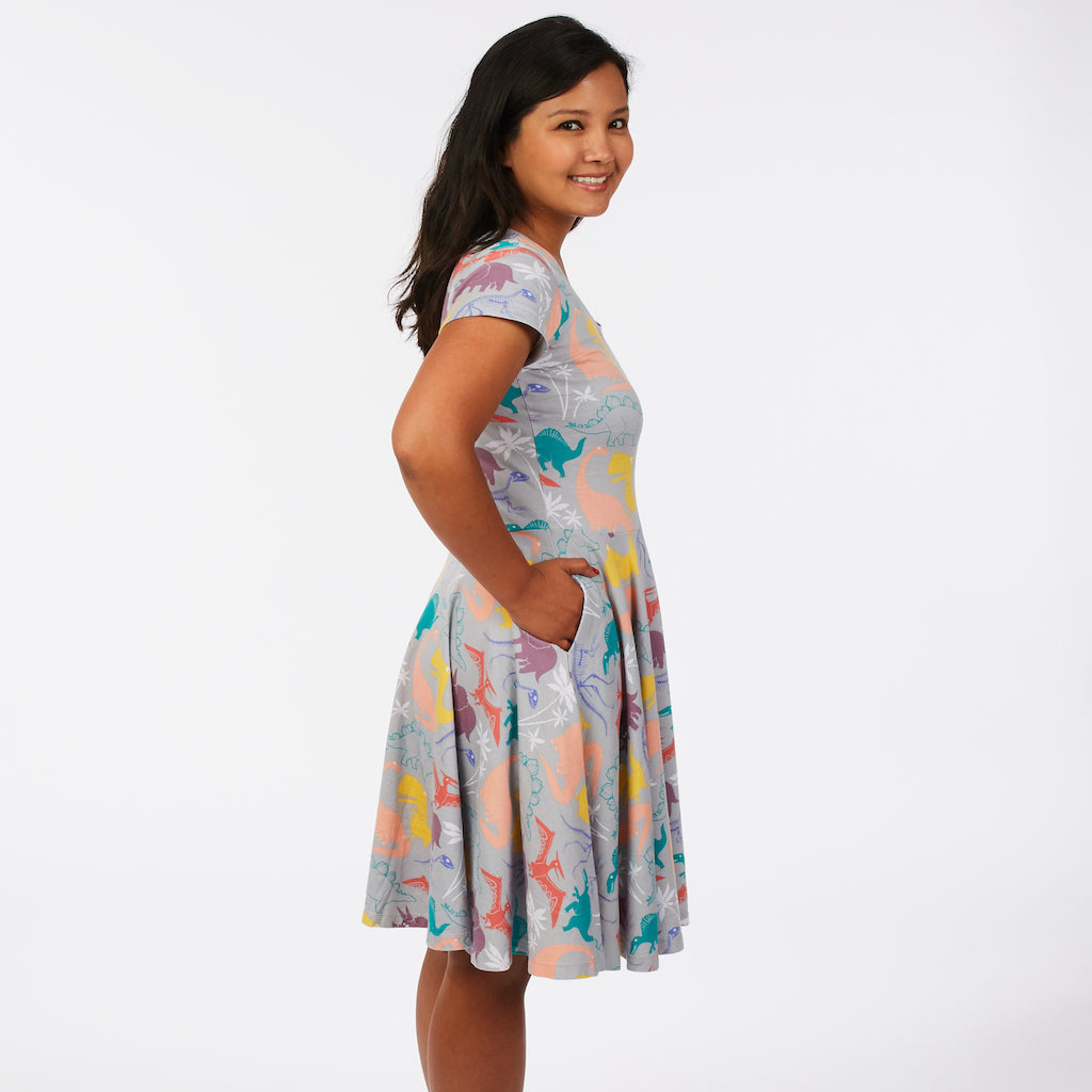 “Mesozoic Mischief” Dinosaurs Short Sleeve Super Twirler Dress with Pockets - Adult