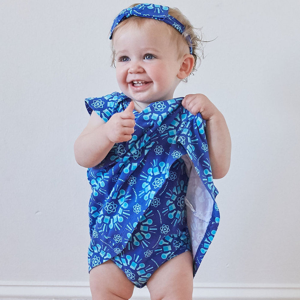 “Atomic Flurry” Infant Dress - Princess Awesome & Boy Wonder