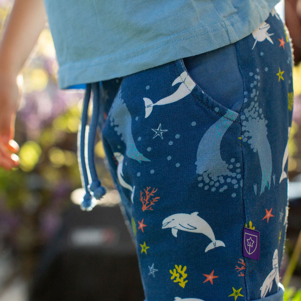 "Deep Sea Dreaming" Dolphins Drawstring Cuffed Shorts with Pockets